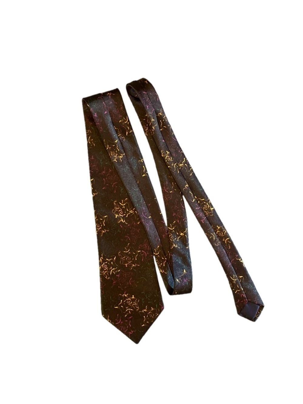 Handmade Mercedes black silk tie with a starfish type pattern 4”